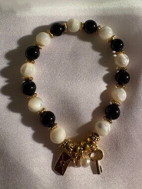 The Darcy Bond Bracelet is a refined, symbolic piece